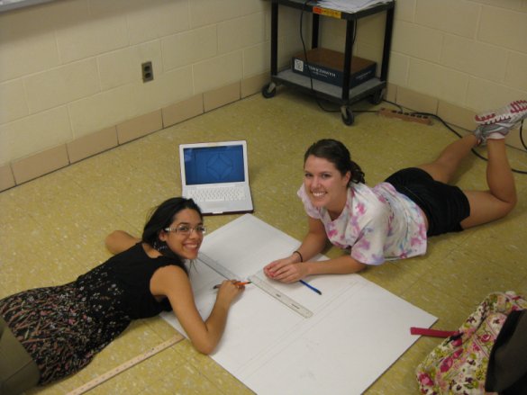 Students working on String Art