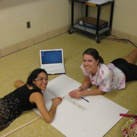 Students working on String Art