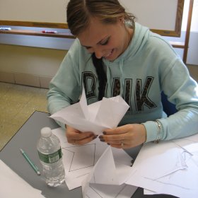 Student folding straight-cut origami